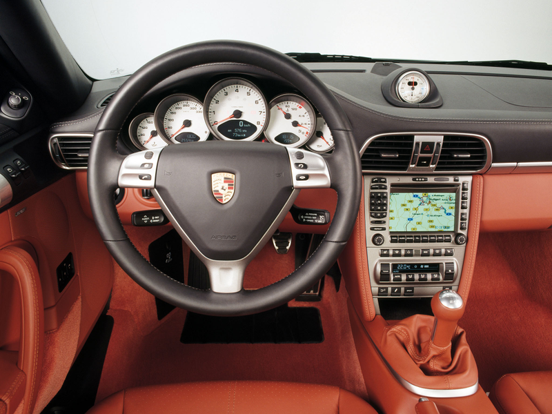 I find the 997 interior to be a perfect balance between sporty, intelligence in execution, and luxury. Photo taken from Google